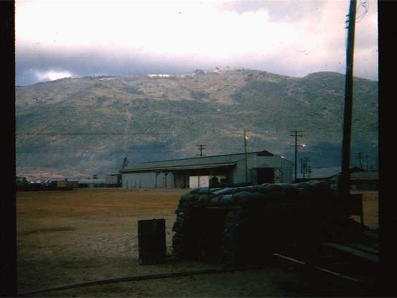 Radar installation (top of mountain) at Qui Nhon AFB w/bunker in foreground Radar installation (top of mountain) at Qui Nhon AFB w/bunker in foreground
