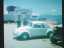 Red Beach “used car lot”…NOT!  VW was probably staff car for USO personnel.